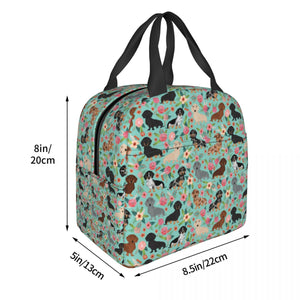 Image of the size of an insulated green color Dachshund lunch bag with exterior pocket in bloom design