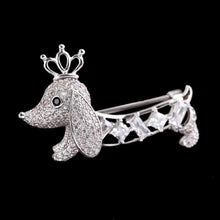 Load image into Gallery viewer, Image of a Dachshund brooch pin made of white gold plated metal alloy and AAA cubic zirconia