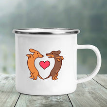 Load image into Gallery viewer, Image of a cutest Dachshund coffee mug featuring two Dachshunds with heart in the middle