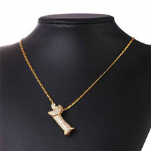 Load image into Gallery viewer, Image of a stone studded dachshund dog necklace in the color gold