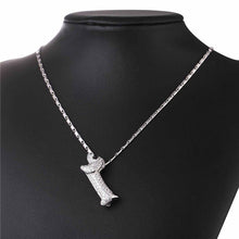Load image into Gallery viewer, Image of a stone studded dachshund dog necklace in the color silver