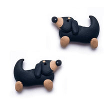 Load image into Gallery viewer, Image of a pair of Dachshund earrings featuring two curvy Dachshunds, made of polymer clay