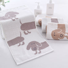 Load image into Gallery viewer, Image of two dachshund hand towels in the color tan brown and light gray