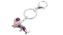 Load image into Gallery viewer, Close up image of a dachshund keychain in the color purple