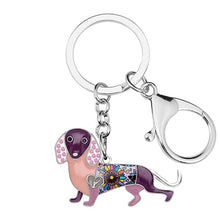Load image into Gallery viewer, Image of a purple color enamel dachshund keychain