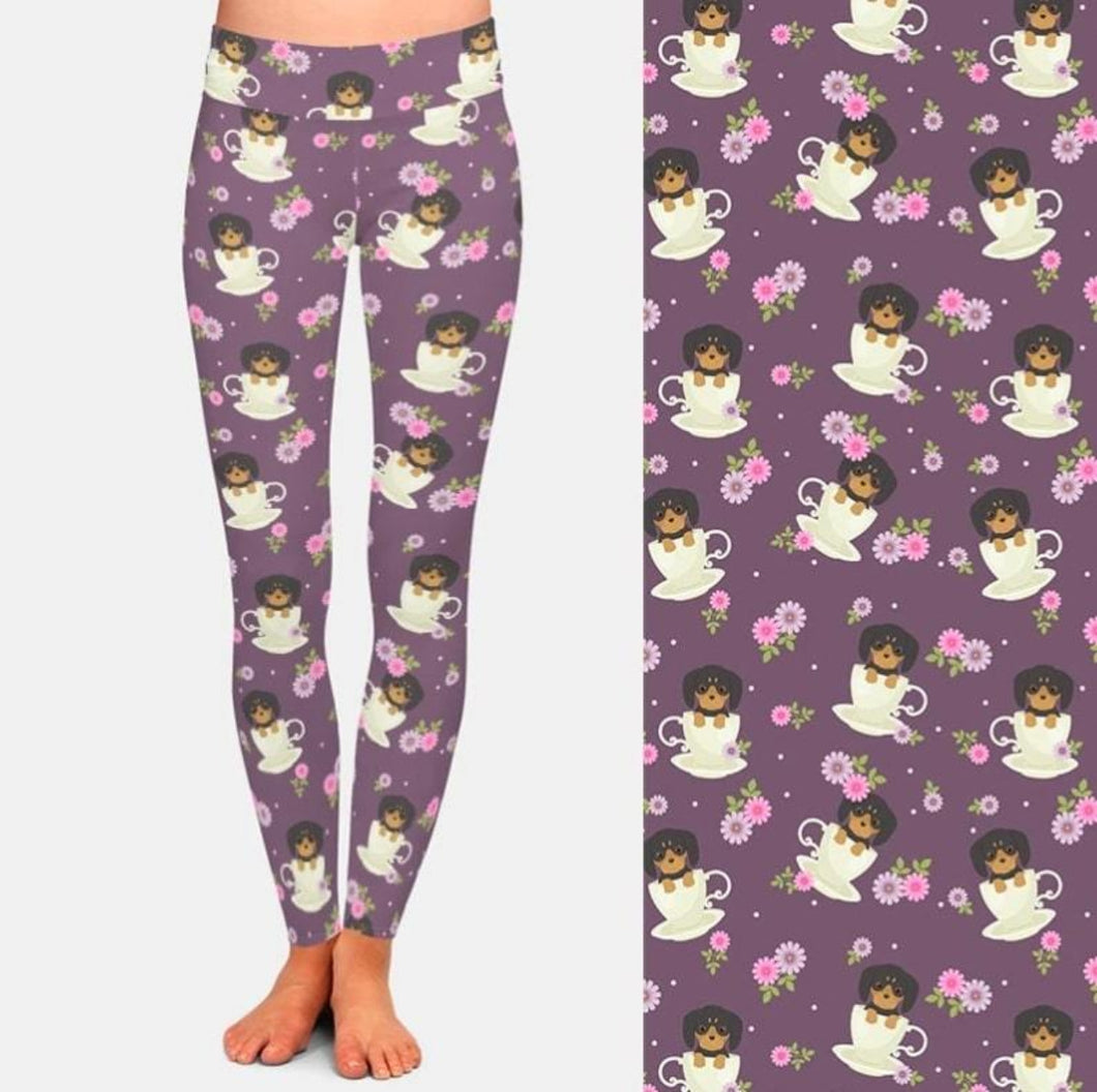 Image of a girl wearing Dachshund leggings with infinite teacup Dachshunds design