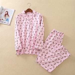 Image of a pink color Dachshund Pajama set front view with an infinite dachshund print design