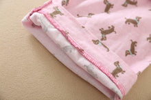 Load image into Gallery viewer, Image of a pink color Dachshund Pajama set sleeves close view with an infinite dachshund print design