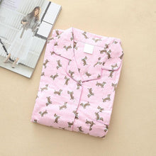 Load image into Gallery viewer, Image of a pink color folded Dachshund Pajama set with an infinite dachshund print design