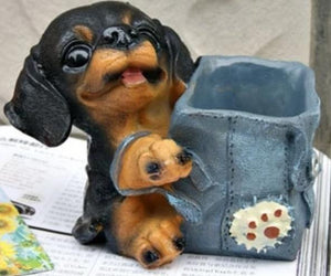 Image of a sausage dog pencil holder featuring the cutest dachshund fur baby with backpack design