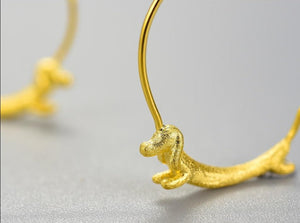 close up image of gold plated dachshund hoop earrings