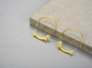 Image of two weiner dog earrings