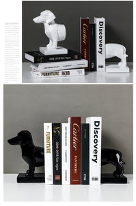 image of two sausage dog bookends in black and white