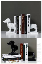 Load image into Gallery viewer, image of two weiner dog bookends in black and white