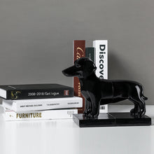 Load image into Gallery viewer, image of sausage dog bookends in black