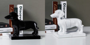 image of two dachshund bookends in black and white