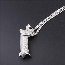 Load image into Gallery viewer, Image of a stone studded weiner dog necklace in the color silver