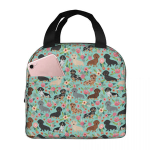 Image of an insulated green color Dachshund lunch bag with exterior pocket in bloom design