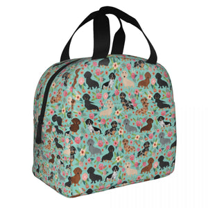 Image of an insulated green color Dachshund bag with exterior pocket in bloom design