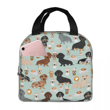 Load image into Gallery viewer, Image of an insulated Dachshund lunch bag with exterior pocket in dachshund and coffee design