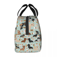 Load image into Gallery viewer, Side image of an insulated Dachshund lunch bag with exterior pocket in dachshund and coffee design