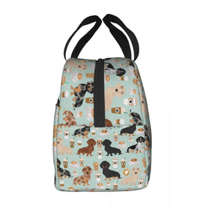 Side image of an insulated Dachshund lunch bag with exterior pocket in dachshund and coffee design
