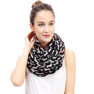 Image of a girl wearing dachshund print scarf