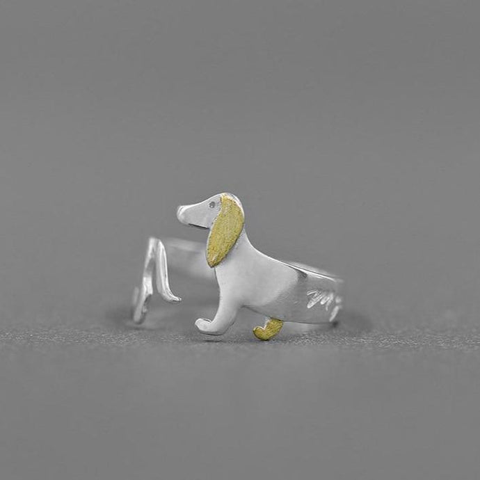 Image of a resizable Dachshund ring made of 925 sterling silver, and plated with real 18k Gold