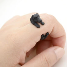Load image into Gallery viewer, Image of a finger wrap Dachshund ring on the finger of a person in the color Black Gun