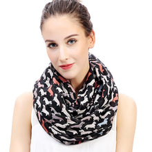 Load image into Gallery viewer, Image of a girl wearing a beautful Dachshund scarf with infinite Dachshunds design