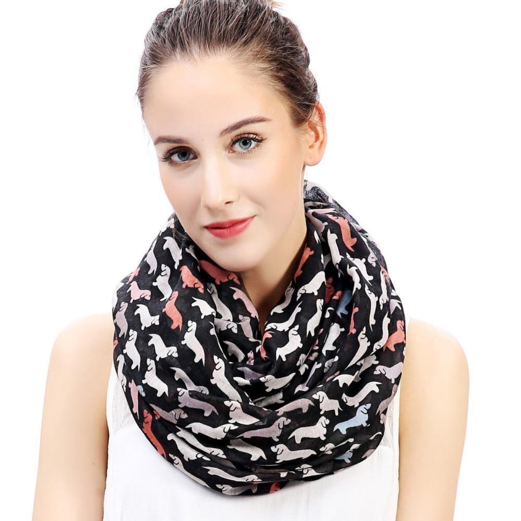 Image of a girl wearing a beautful Dachshund scarf with infinite Dachshunds design