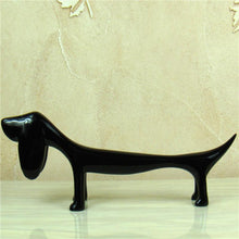 Load image into Gallery viewer, Image of a Dachshund statue in the color black made of resin