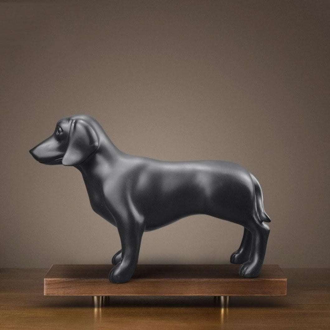 Image of a stunning black Dachshund statue made of resin