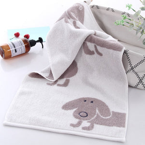 Image of a dachshund towel in the color light gray