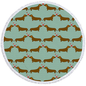 Image of a round dachshund towel with dachshunds kissing on green with white polka dots background