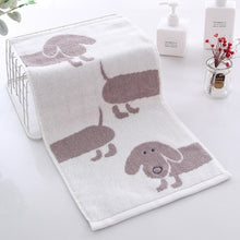 Load image into Gallery viewer, Image of a dachshund cotton hand towel in the color light gray