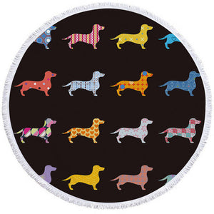 Image of a round dachshund towel with multicolor dachshunds on black background