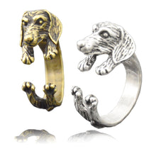 Load image into Gallery viewer, Image of dachshund wrap rings in the color bronze and silver