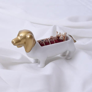 Image of a beautiful white and gold colored Dachshund jewelry box made of resin