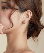 Load image into Gallery viewer, Image of a lady wearing sterling silver boston terrier earrings