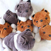 Image of many english bulldog stuffed animals