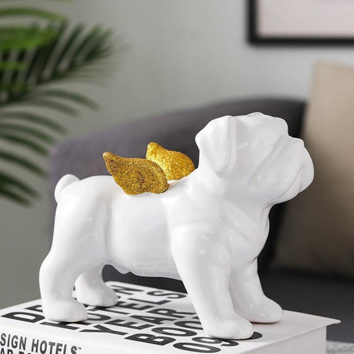 Image of a beautiful white color English Bulldog statue made of white ceramic with gold-plated angel wings