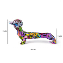 Load image into Gallery viewer, Image of a multicolor extra long graffiti dachshund statue measurement