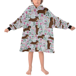 image of a kid wearing of a dachshund blanket hoodie for kids - grey