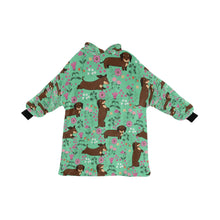 Load image into Gallery viewer, image of a green dachshund blanket hoodie for kids