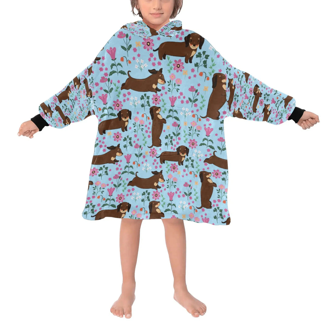 image of a kid wearing of a dachshund blanket hoodie for kids - light blue