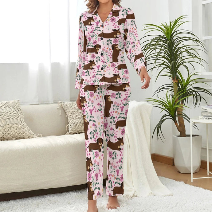 image of a woman wearing dachshund pajamas set in pink