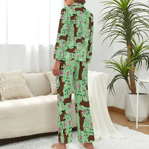 image of a woman wearing a green dachshund pajamas set for women - back view