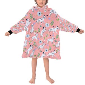image of a kid wearing a dalmatian blanket hoodie for kids - light pink
