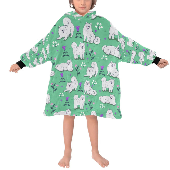 image of a kid wearing a samoyed blanket hoodie for kids - green